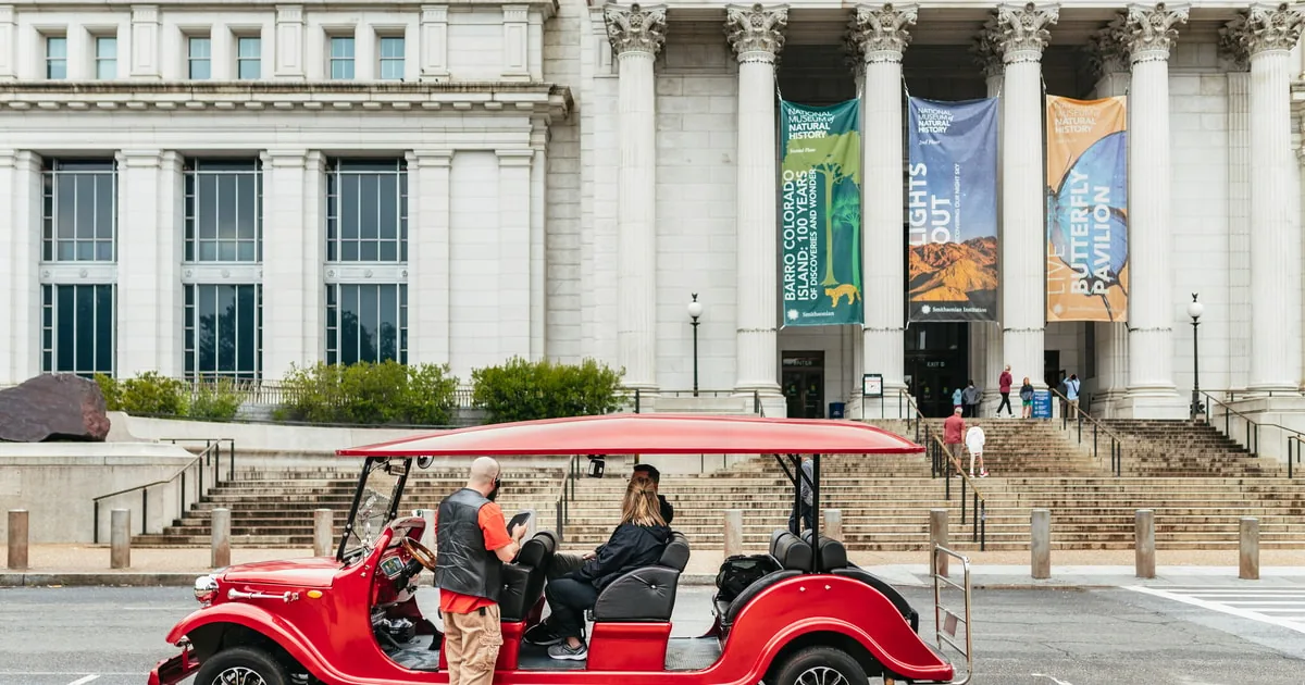 The electric-cart monuments tour, which runs by day and after dark